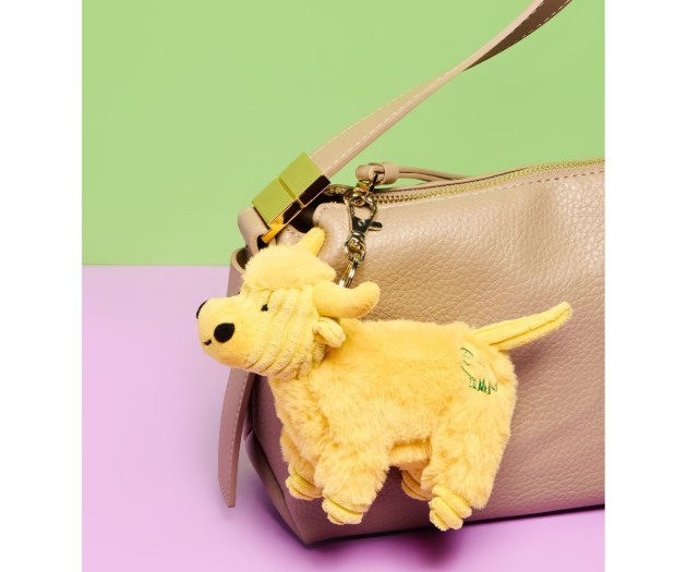 Yellow Highland cow bag charm lifestyle website